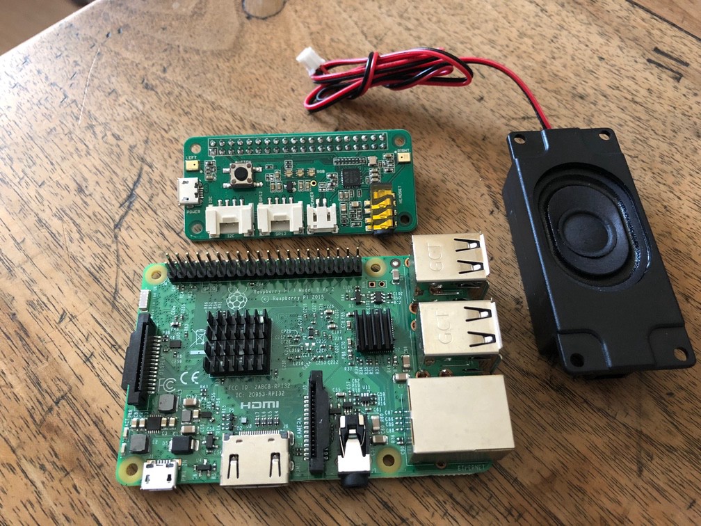 A Raspberry 3 model b, a ReSpeaker 2-Mics Pi HAT and a speaker