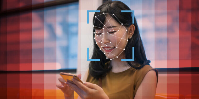 The Heads-Up Display (HUD) of facial recognition software is actively operational on a human visage.