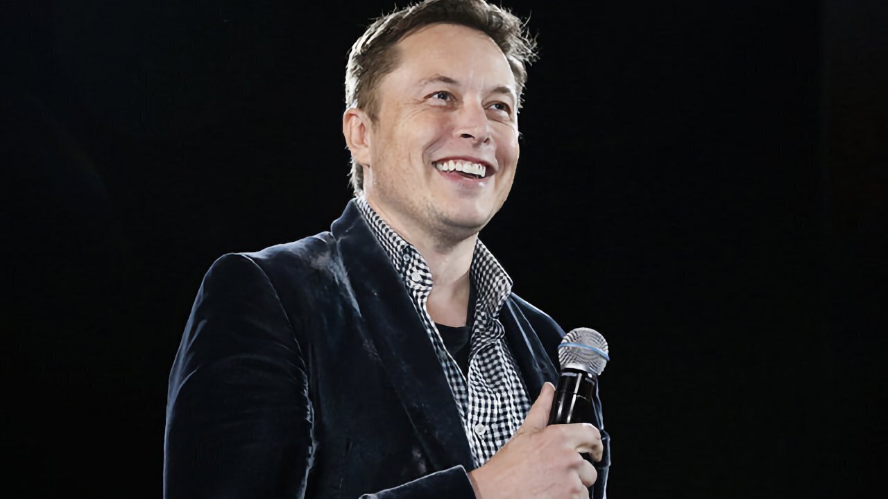 An image capturing Elon Musk, exhibiting a cheerful demeanor, expertly wielding a microphone in one hand.